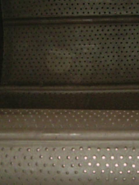 Bande grenailleuse en caoutchouc